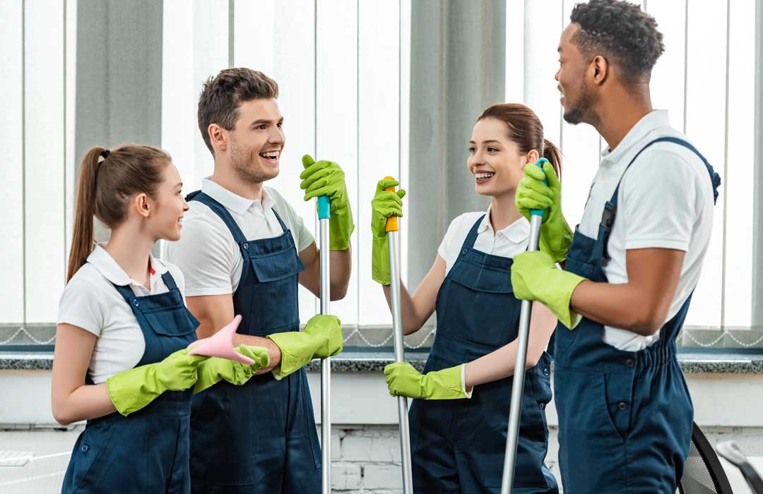 Our team smiles during a professional cleaning service.